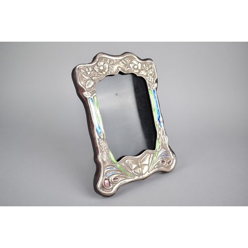 403 - A Reproduction Art Nouveau Silver and Enamelled Photo Frame, 21.5cm high