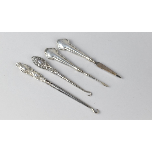 404 - A Collection of Silver Handled Tools to Include Button Hooks etc