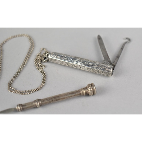 408 - A Sterling Silver Cased Multitool on Chain Together with a Silver Propelling Tool