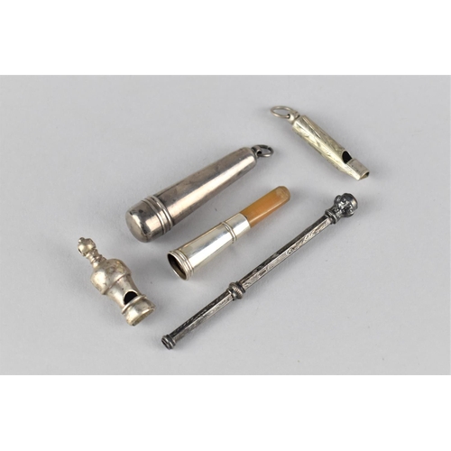 421 - Two White Miniature Whistles Together with a Silver Cased Amber and Silver Cheroot and a Silver Prop... 