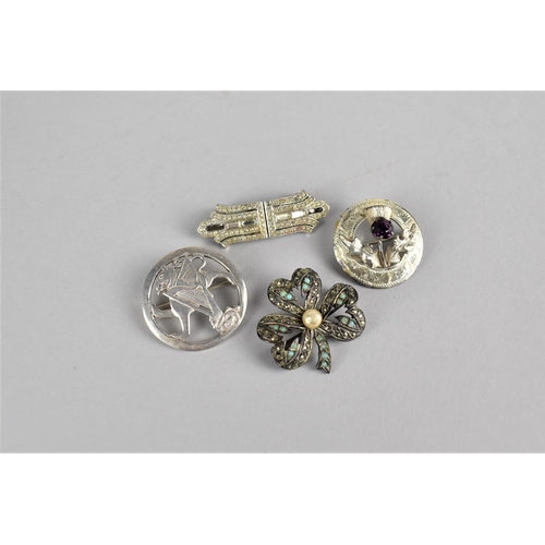 439 - Four Various Silver Brooches to Comprise Silver Dragon and Harp, Scottish Thistle, Clover etc