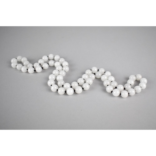 447 - A Reproduction White Jade Bead Necklace