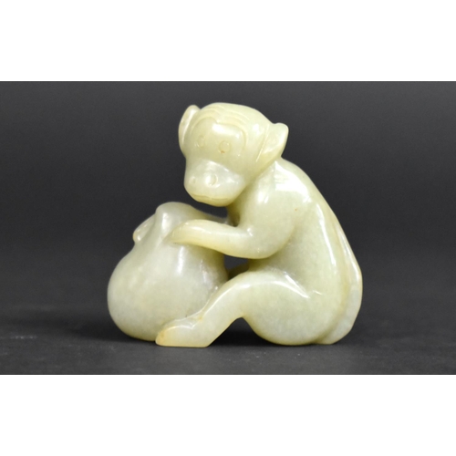 449 - A Reproduction Chinese Jade Carving of a Monkey