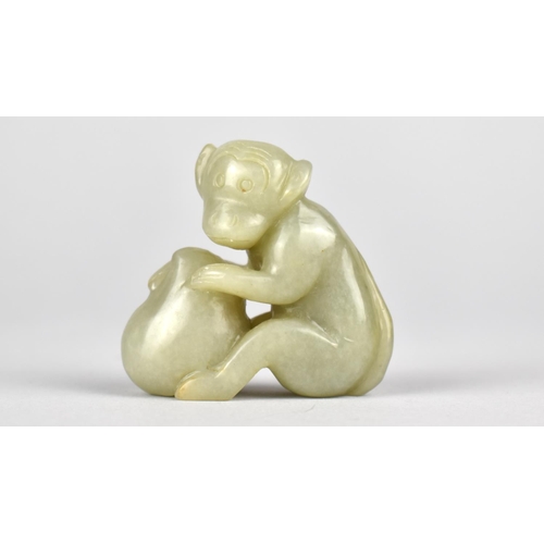 449 - A Reproduction Chinese Jade Carving of a Monkey