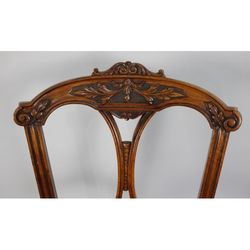 492 - A Pair of 19th Century Walnut Side Chairs with Carved and Pierced Backs, Upholstered Seats and Suppo... 