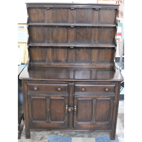 500 - A Mid 20th Century Ercol Dresser with Panelled Cupboard Two Door Base Surmounted by Two Drawers