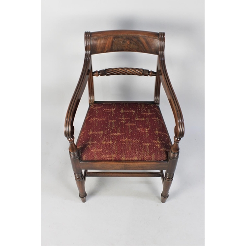 507 - A Victorian Mahogany Framed Armchair with Twisted Back Support and Reeded Scrolled Armrests