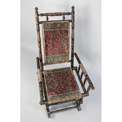 508 - A Late Victorian Mahogany Spindle Framed American Rocking Chair with Tapestry Seat and Back, in Need... 