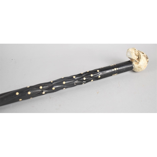 7 - A Colonial Walking Cane with Bone Studding and Replacement Skull Handle, 78cms Long