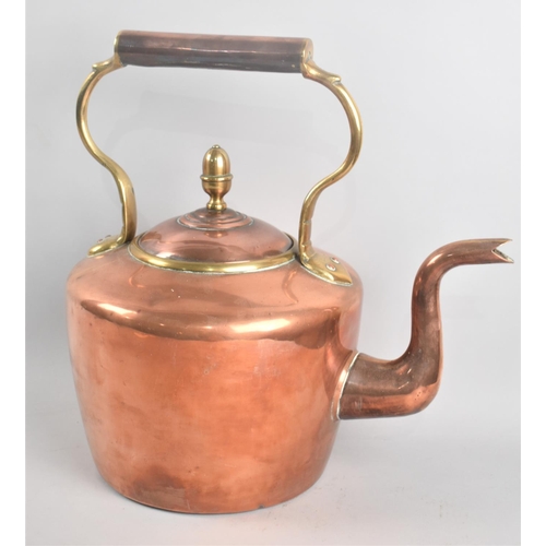 86 - A Large Copper Kettle with Brass Acorn Finial, 33cms High