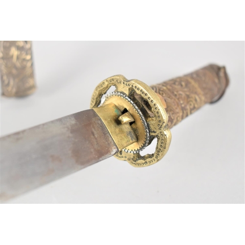 91 - A Vintage Japanese Tanto with Brass Hilt and Scabbard decorated in Floral Motif, Steel Blade, 47cms ... 