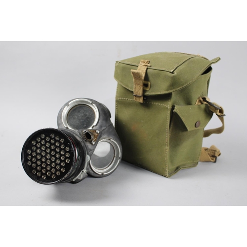 98 - A Vintage Gas Mask in Canvas Carrier