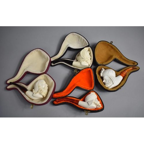 147 - A Collection of Various Modern Reproduction Meerschaum Type Cased Pipes