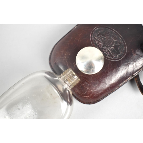 25 - A Glass Hip Flask with Silver Screw off Lid in Tooled Leather Pouch having Embossed Royal Crest and ... 