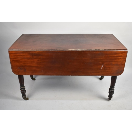 406 - A 19th Century Mahogany Pembroke Table on Turned Caster Supports, 121cm x 56.5 x 71cm high