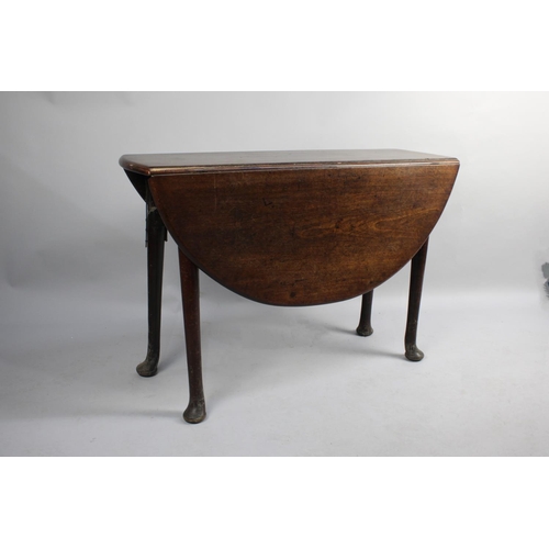 412 - An 19th Century Oak Drop Leaf Table with Pad Feet, 104cm wide, with Repair etc