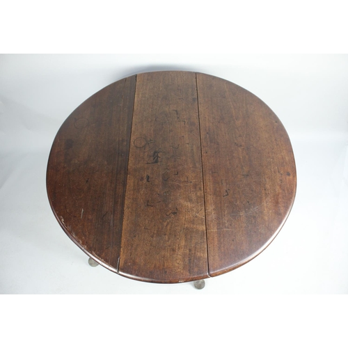 412 - An 19th Century Oak Drop Leaf Table with Pad Feet, 104cm wide, with Repair etc