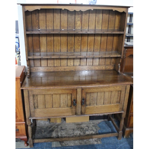 416 - An Oak Sideboard with Panelled Cupboard Base Raised on Turned Supports and Having Two Tier Rack, 137... 