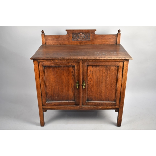 418 - An Early 20th Oak Washstand with a Carved Gallery Back, Panelled Cupboard Base on Square Supports, 9... 