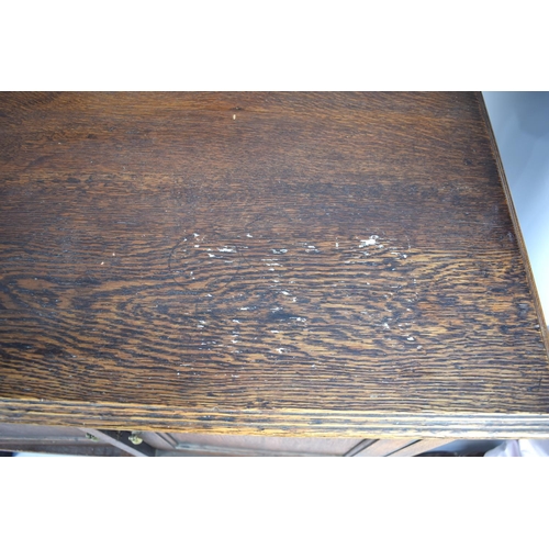 418 - An Early 20th Oak Washstand with a Carved Gallery Back, Panelled Cupboard Base on Square Supports, 9... 