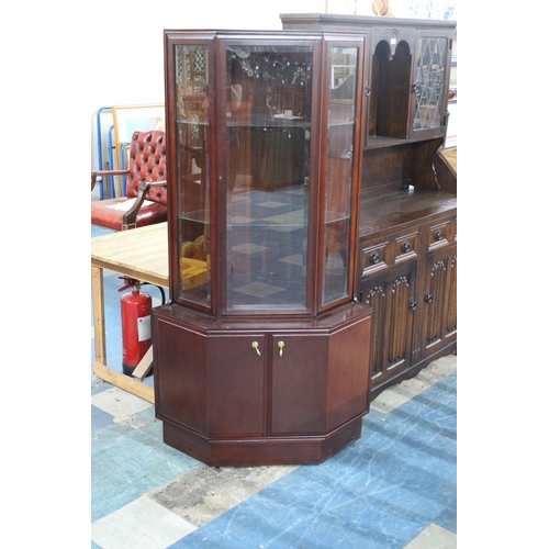 424 - A Turnidge Corner Display Cabinet of Canted Form with Cupboard Base