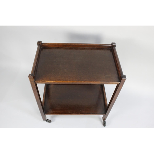 53 - A Mid 20th Century Two Tier Oak Tea Trolley with Galleried Top and Stretcher Shelf, 65cms Wide