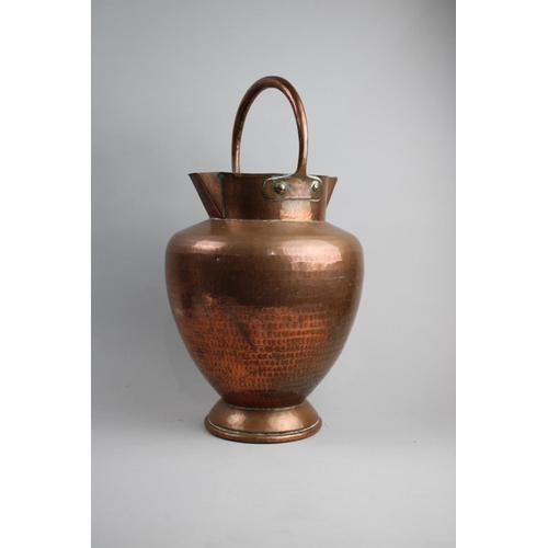 67 - An Early 20th Century Hand Beaten Copper Water Carrier, Probably North African, 40cms High