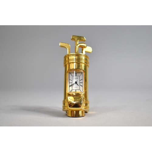 10 - A Modern Miniature Brass Novelty Desk Top Clock in the Form of a Bag of Golf Clubs, 7cms High