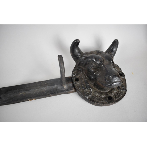 119 - A Modern Cast Iron Wall Mounting Five Hook Coat Rail, Supports in the form of Bull masks, 75cms Wide