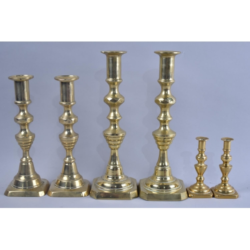 126 - Three Pairs of Polished Brass Candlesticks, Tallest 25cms High