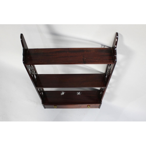 134 - A Modern Mahogany Wall Hanging Shelf Unit with Pierced Supports and Single Base Drawer, 41cms Wide a... 