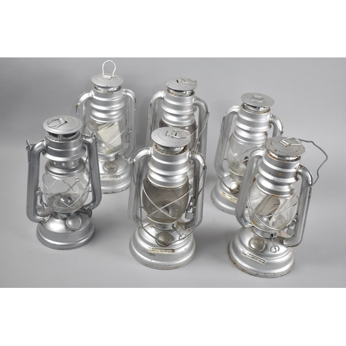 147 - A Collection of Six Various Mid 20th Century Metal Hurricane Lamps, Each 26cms High