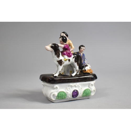 17 - A Late 19th Century Continental Fairing depicting Queen Victoria with Children and Dogs, 8cms Wide