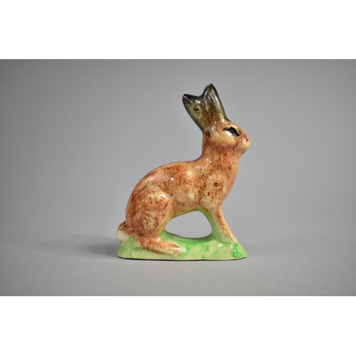 18 - A Spongeware Decorated Study of Seated Rabbit, 10cms High