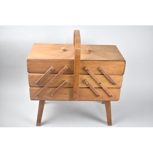 183 - A Mid 20th Century Cantilevered Sewing Box and Contents