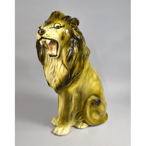 186 - A Large Plaster Study of a Seated Lion, 58cms High