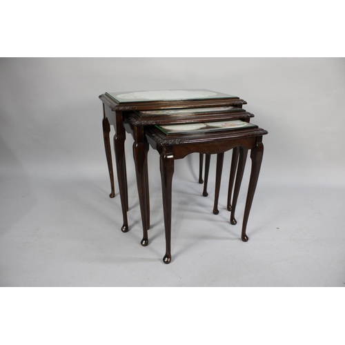 198 - A Mid 20th Century Nest of Three Bow Fronted Mahogany Tables, 55cms Wide