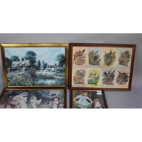 247 - A Collection of Five Framed Completed Jigsaw Puzzles