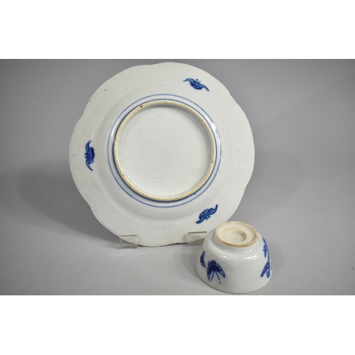 252 - A Japanese Blue and White Plate with Applied Coloured Enamel Highlights Together with a Japanese Blu... 