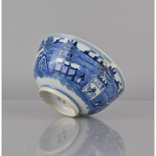 253 - A Chinese Porcelain Blue and White Bowl decorated with River Village Scene and Central Bird in Branc... 