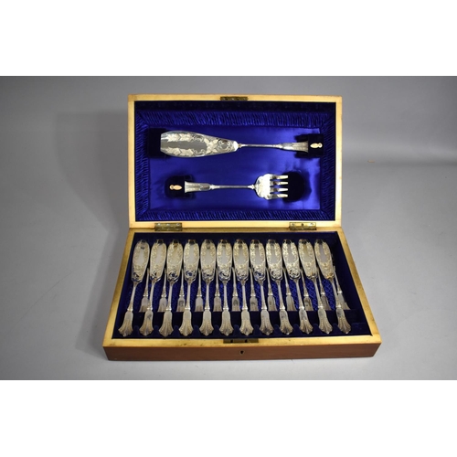 37 - An Edwardian Mahogany Canteen Containing 12 Silver Plated Fish Knives and Forks and Pair of Servers,... 