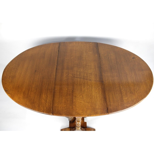 467 - A Mid 20th Century Oak Gate Leg Drop Leaf Oval Topped Dining Table, 96cms Wide