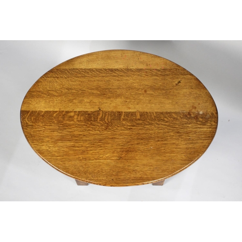 469 - An Edwardian Oak Oval Topped Occasional Table with Bobbin Supports, 60cms wide