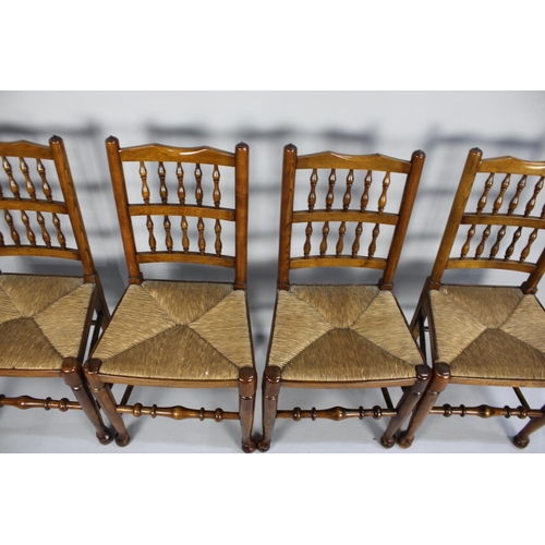 476 - A Set of Four Rush Seated Spindle Back Dining Chairs