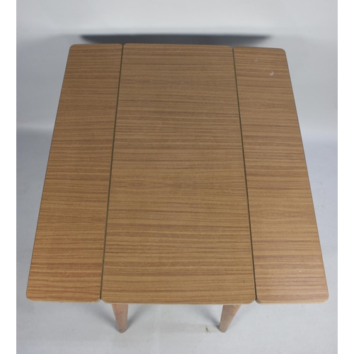 488 - A 1970s Formica Topped Drop Leaf Kitchen Table, 91cms Wide