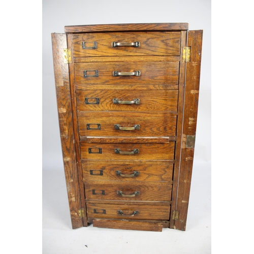 490 - An Edwardian Oak Eight Drawer Wellington Chest, 52cms by 41cms by 108cms High