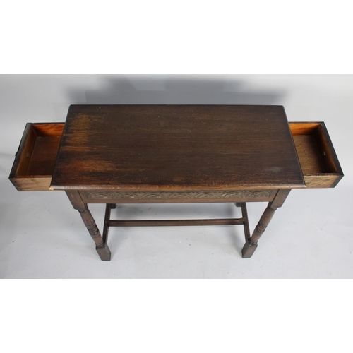 493 - A Mid 20th Century Oak Rectangular Side Table with Single Long End to End Drawer, Carved Front Rail ... 