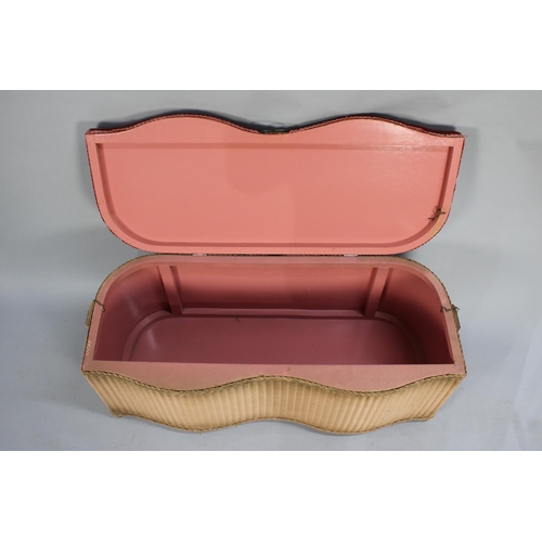 497 - A Pink Lloyd Loom Nursing Chair and a Serpentine Front Box Ottoman with Upholstered Lid