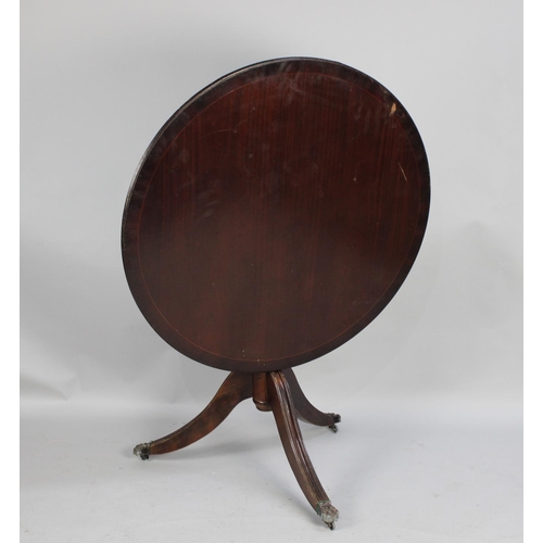 498 - A Late 20th century Mahogany Snap Top Tripod Table, 90cms Diameter