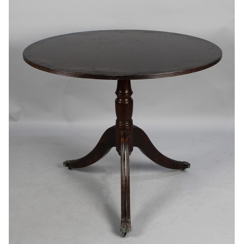 498 - A Late 20th century Mahogany Snap Top Tripod Table, 90cms Diameter